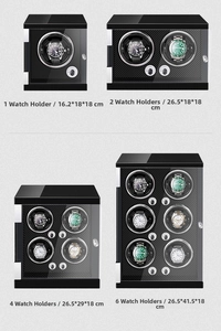 Four different sizes of black carbon fiber watch winders with clear glass view windows