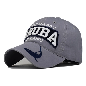 Detailed view of Aruba island 3D embroidery and marlin silhouette on gray baseball cap