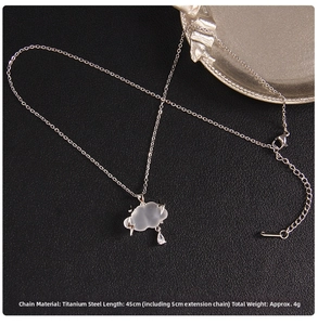 Detailed view of titanium steel cloud necklace with lightning and teardrop crystal pendant
