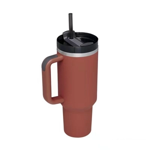 Detail view of red-brown 40oz stainless steel tumbler with handle and straw