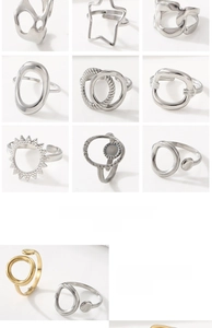 Detailed grid showing hollow heart and geometric patterns on polished titanium steel rings