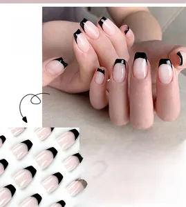 Short coffin press on nails featuring black French tips and pink base finish