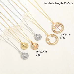14K gold plated smiley and hugging hands pendant necklace set with cubic zirconia stones