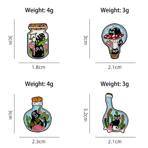Enamel black cat brooches set with plants and mushroom patterns on white background