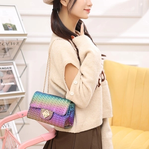 Rainbow gradient woven crossbody bag with gold diamond lock and elegant chain strap