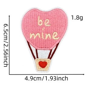 Detail of pink embroidered heart balloon patch with be mine text and size dimensions