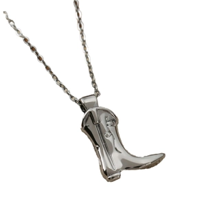 Silver cowboy boot pendant necklace with a polished finish on a delicate link chain