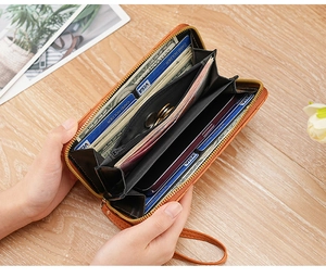Detailed interior of long leather wallet with multi-card slots and cash compartments