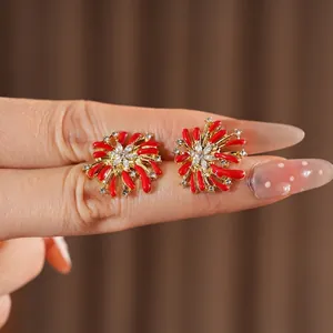 Sparkling firework stud earrings with red enamel petals and gold plating for women