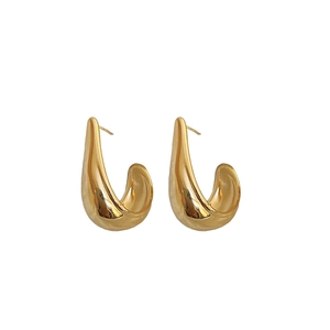 Minimalist golden teardrop stud earrings with polished 18k gold metallic finish