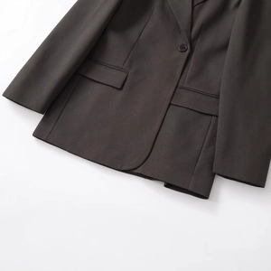 Slim fit dark taupe blazer with single button closure and symmetrical flap pockets