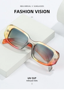 Macro view of rectangle sunglasses featuring translucent gradient frames and UV protection