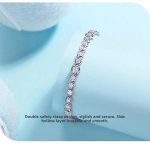 Detail view of 925 silver tennis bracelet with double safety clasp and crystal inlay