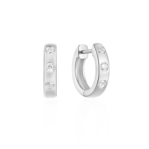 Detailed view of S925 silver huggie hoop earrings featuring three sparkling zircon stones