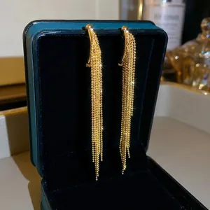 Elegant gold plated tassel drop earrings with crescent moon hook for formal parties