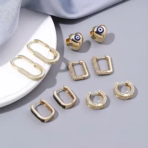 Golden heart twist earring set with pavé rhinestones and Y2K aesthetic designs