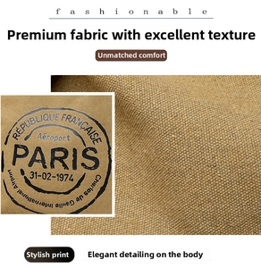 Close-up of textured canvas fabric with vintage Paris airport stamp print on tote bag