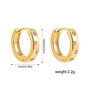 18K gold plated sun star earrings with zircons measuring 13mm by 14mm on white background