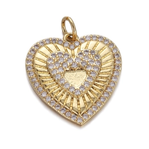 Exquisite gold heart-shaped zircon pendant with layered radial texture and sparkling stones