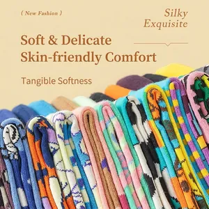 Assorted colorful patterned cotton mid-tube socks with leopard and geometric designs