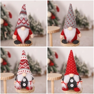 Set of four Christmas gnomes with different knitted hats and long white beards decor