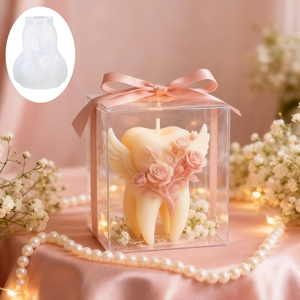 Silicone mold for angel wing tooth shaped candles with floral relief in gift box