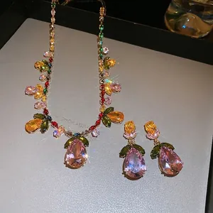 Luxurious gold flower jewelry set with colorful teardrop zircons and crystals