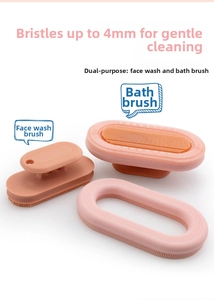 Macro detail of silicone bath brush showing soft 4mm bristles and facial cleanser set