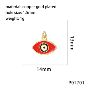 Macro shot of 14mm red enamel Evil Eye pendant with copper gold plating and zircon
