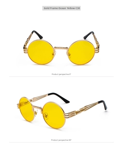 Detail view showing gold metal steampunk sunglasses with yellow lenses and wire-wrapped temples