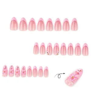 3D pink flower press-on nails with French pearl finish and almond shape style