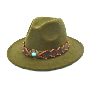 Detail of dark olive wool fedora with brown braided band and turquoise stone accent