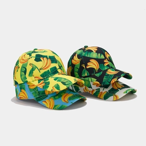 Detail of printed baseball caps with tropical banana patterns in four different colors