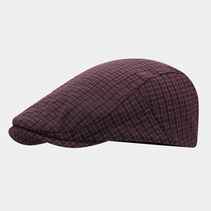 Side view of a vintage burgundy plaid flat cap featuring detailed cotton stitching
