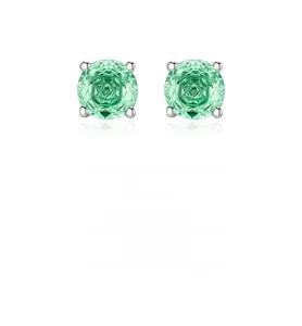 Macro shot of S925 sterling silver stud earrings with sparkling green round cut stones