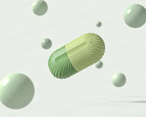 Macro shot of green capsule ice roller with wavy texture and max water level marking