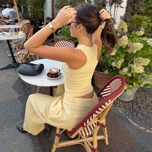 Women's summer two-piece set with yellow ribbed tank top and linen wide-leg pants