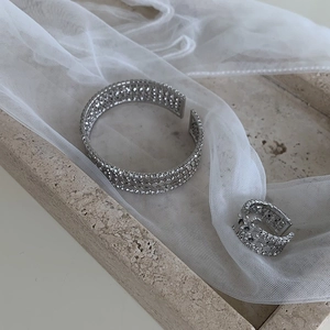 Modern multilayer zircon open bangle and ring set with honeycomb silver metal texture