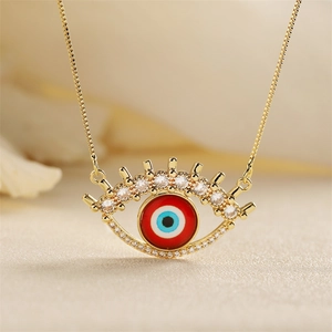 Golden Evil Eye pendant necklace with colorful zircons on a delicate box chain
