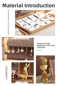 Detailed view of beech wood and brown suede jewelry display trays with resin art decor