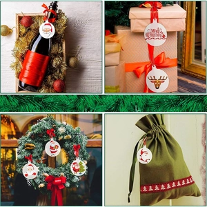 DIY clear acrylic Christmas ornaments with red ribbons shown on festive gift boxes