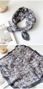 Detail of purple floral cotton linen scarf with soft breathable fabric and fine stitching