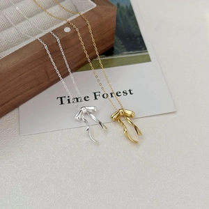 Minimalist 925 sterling silver bow pendant necklace in gold and silver finishes