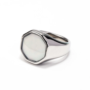 Macro view of polished octagonal ring featuring a natural white shell inlay in silver finish