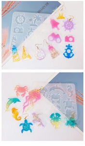 Detailed silicone molds for ocean themed resin jewelry with anchor and dolphin shapes