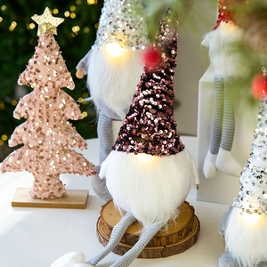 Pink sequin Christmas gnome with LED lights and matching tabletop tree decoration
