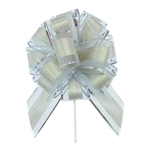 Close-up of a large silver and white checkered texture pull bow for gift packaging
