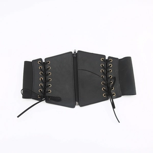 Gothic retro wide black waist belt with front zipper and lace-up details on white background