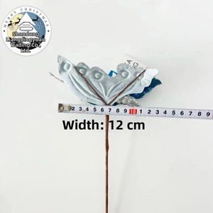 Detail view of 12cm silver glitter Christmas butterfly with tape measure on white background