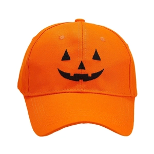 Orange Halloween baseball cap with black pumpkin Jack-o-lantern face on white background